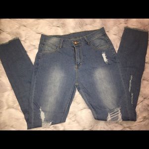 Denim colored pants with fashionable distress